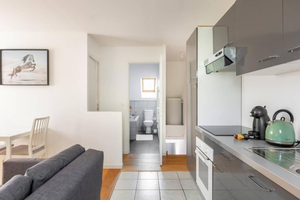 Grand Confort, Appartement Osny المظهر الخارجي الصورة